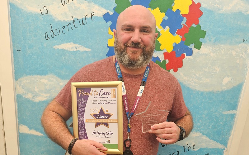 Activity Co-ordinator Anthony Cobb, with his Champion of Activities and Wellbeing Award