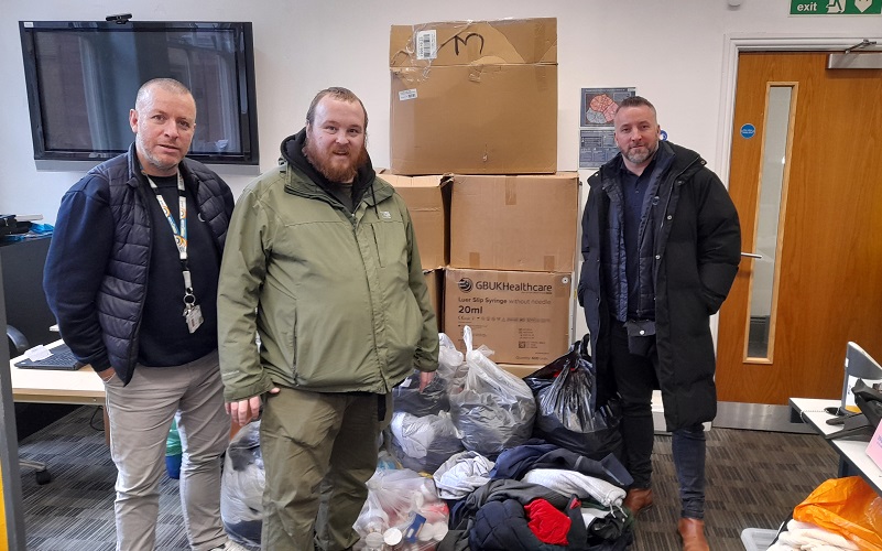 Service users and staff from Cygnet Bury Hudson with their donations to Barnabus